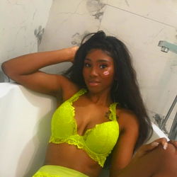 Aliyah Chanel, a lingerie model posing for a photo