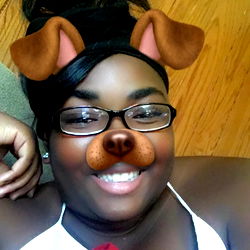 Smiling Woman with Dog Ears on Pillow