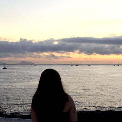 Fran enjoying a serene sunset at the beach