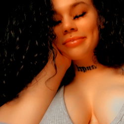 Dec in a blue bra and tank top