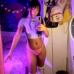 Young Brazilian Model Lua SG in a Pink and White Striped Tank Top and Booty Shorts