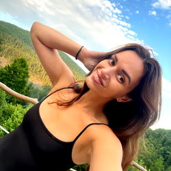 Female Model Posing for Photograph in Natural Setting