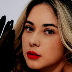 Julieta, a Medellín Model With Vibrant Red Lipstick and Glossy Nails
