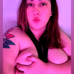 Hot and wet busty model in pink room