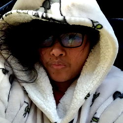 Cute Okami pose with a stuffed animal,