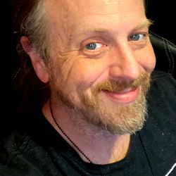 Bearded Man with Mustache, Necklace and Baseball Cap
