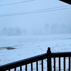 Foggy Evening at a Snowy Farm