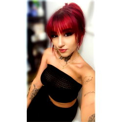 Onlyfans Model Alice Barela Poses for Camera in Stylish Outfit and Tattoos