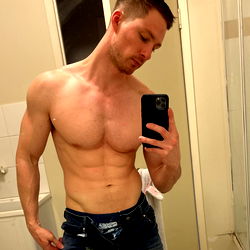 Fit Aussie Adonis Showcasing His Abs in Bathroom Mirror