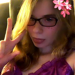 A Female Model Posing for an OnlyFans Photo