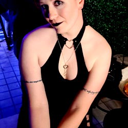 Striking Taul Valentine in a seductive pose, capturing the essence of a confident model.