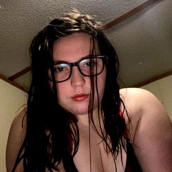 Ash: A Strong and Confident Woman in Black