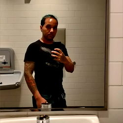 CarlosBattousai in a Bathroom Mirror