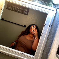 A person in a mirror reflection