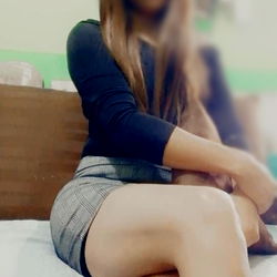 OnlyFans Model Alexa Sitting on Bed, 2021