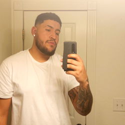 A Man Posing for a Selfie