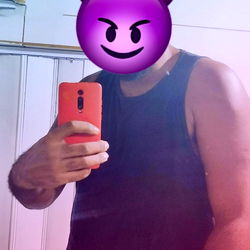 Stylish Man with a Devil Emoji on Face