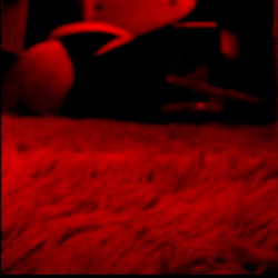 Red Hue in a Dusty Corner