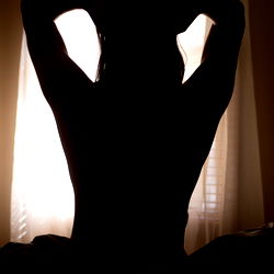 Glamorous OnlyFans Model Ashley Zion in Silhouette by Window, Gilroy California