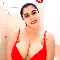 OnlyFans Model Andrea_🫦 Poses in Red Bra