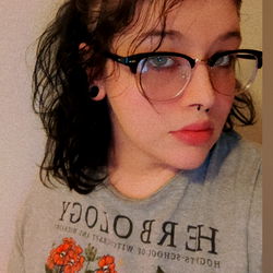 Kendra: Emo Style with Flower Tattoo and Black Hair