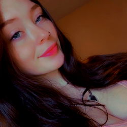 A captivating young woman, 🤍Jai🤍, sharing a moment with the camera on a video call.