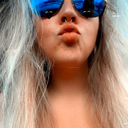 OnlyFans Model LexxiRose Posing in Sunglasses and Tank Top