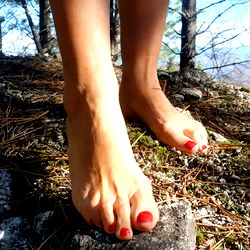 A Model's Foot on Rocks