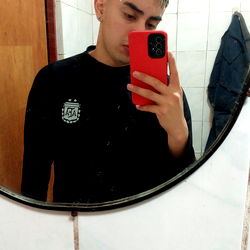 Ethan Rodriguez - Fashionable Male Model in a Bathroom Mirror