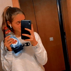 Alba, a young woman with short hair