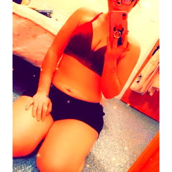 Beautiful Model Sitting on Floor for Promotional Purpose