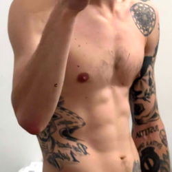 Fit Physique with Tattoos and Piercings