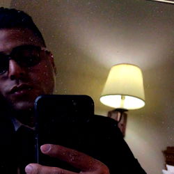 Stylish Man in Suit, Taking a Selfie with Phone