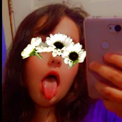 Girl Tongue Out in Daisy Glasses