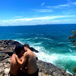 A Couple Sharing a Private Moment at the Ocean