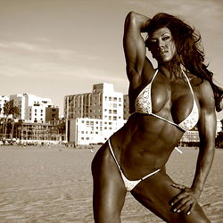 Amber DeLuca: OnlyFans Model, Striking Pose on Beach