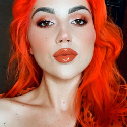 Hales: Vivid Red Hair, Striking Makeup