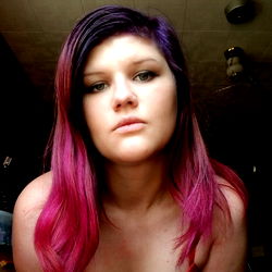 Vibrant Model Posing with Pink Hair