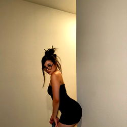 Model: BabyStasia in a Black Tank Top