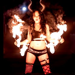 Stylish Female Fire Dancer Performing on Stage