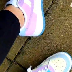 Vibrant Sneakers Against a Gray Backdrop