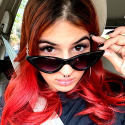 Stylish Model with Vivid Eyes and Bold Hair