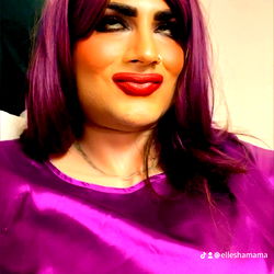 Striking Makeup and Vivid Hair in a Vibrant Purple Blouse