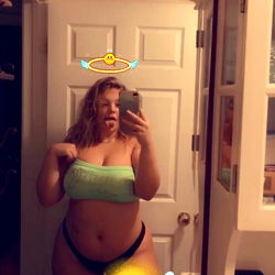 Model posing in bathroom