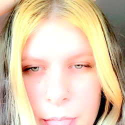 A Woman with Blonde Hair and a Tattoo