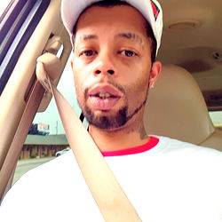 Male Driver in White T-Shirt