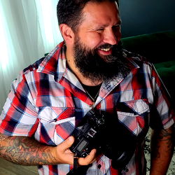 Onlyfans model posing with camera for DcKetcham Photography