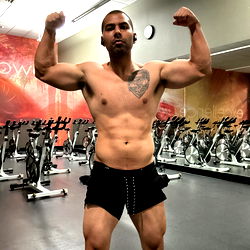 Strong and Shirtless Fitness Model