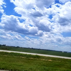 OnlyClouds - Serene View of a Cloudy Sky over a Road