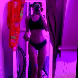 OnlyFans Model Angel's Photo Shoot in Purple Lighting